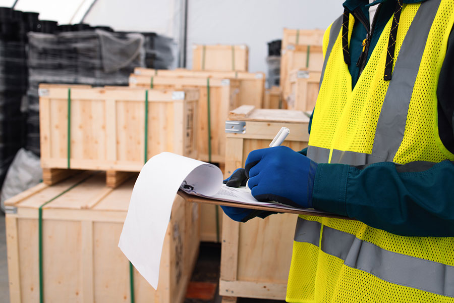 Warehouse worker with clipboard