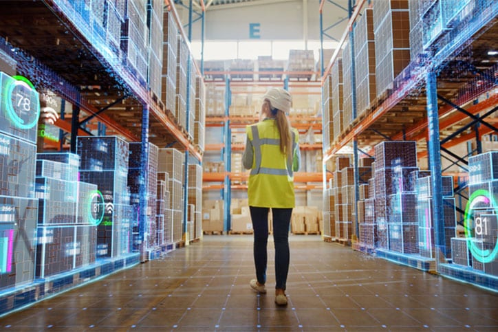 Woman Walking in Warehouse with Technology Effects